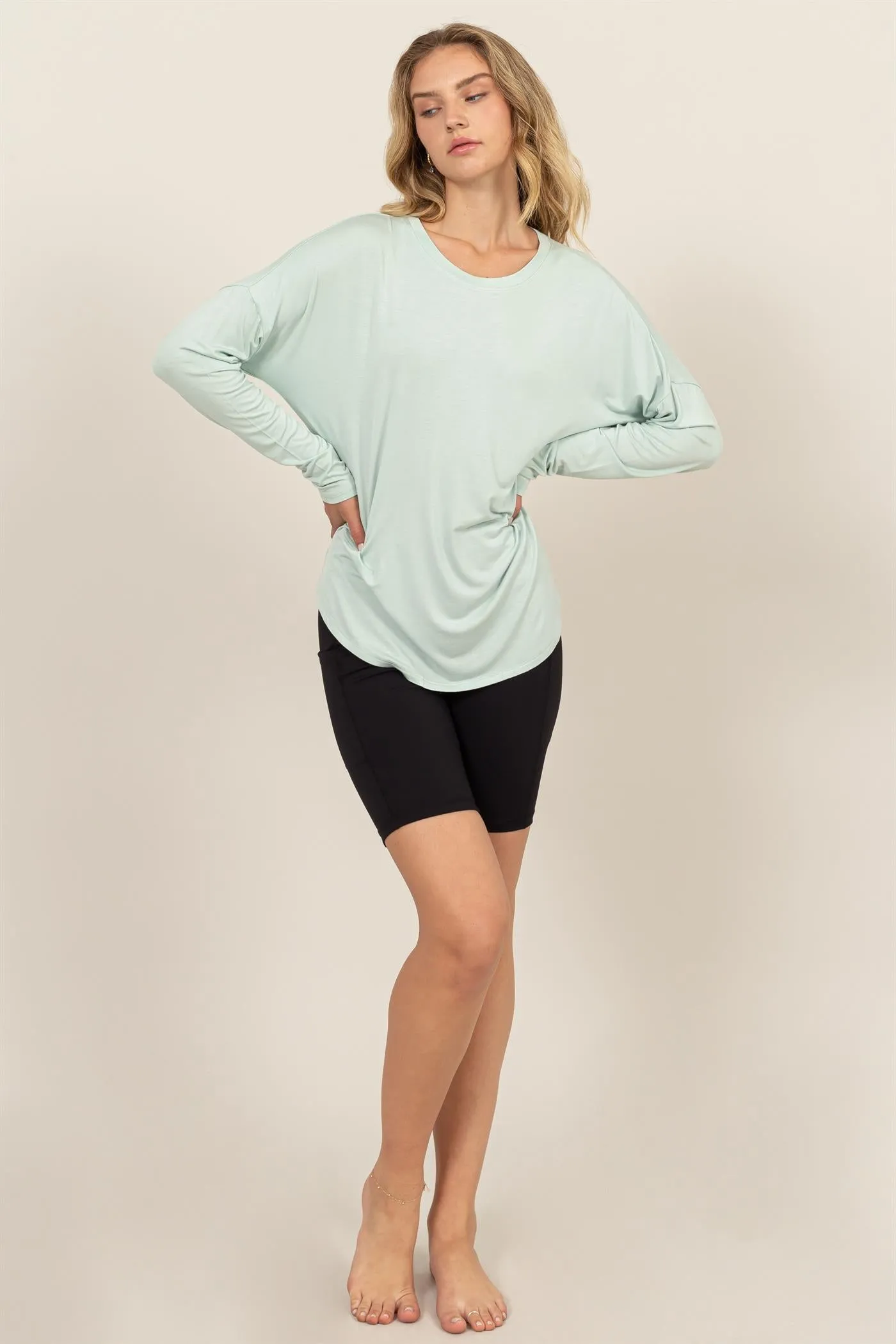 DZ24F349-Round Neck Long Sleeve Curved Hem Top