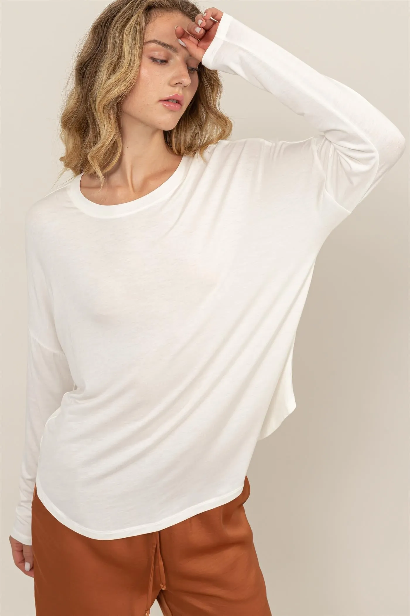 DZ24F349-Round Neck Long Sleeve Curved Hem Top